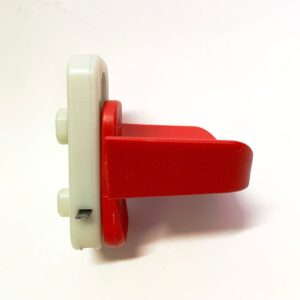 Dispositivo de seguridad con cuchara roja